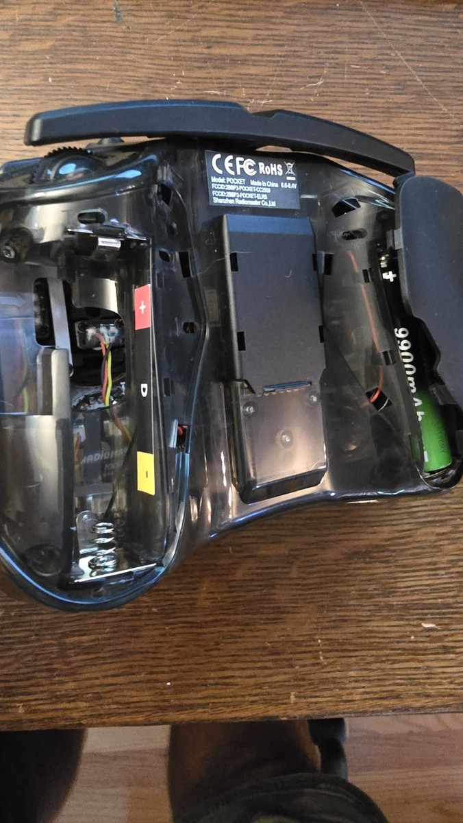 Large D battery compartment marked with BatteryBright D direction label
